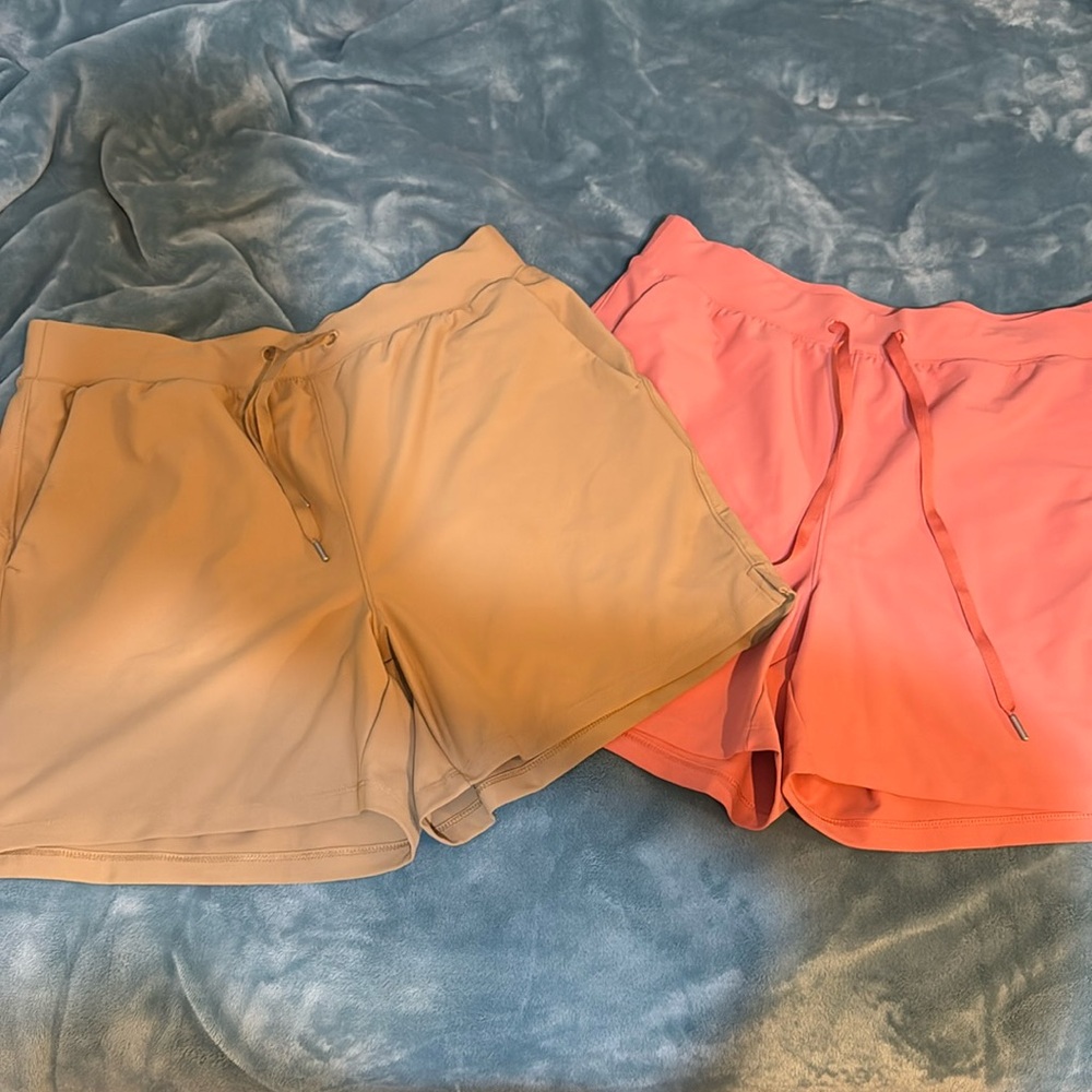 Old Navy Active shorts. Medium coral and camel colors. Like new.